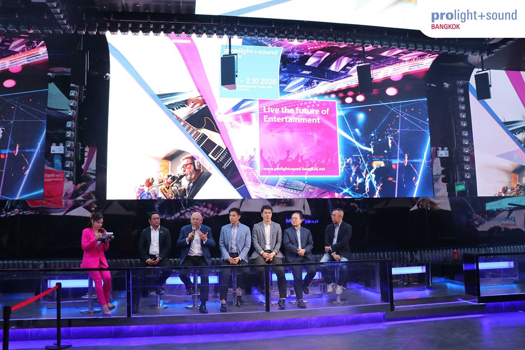 Panel discussion on stage with large LED screen at Prolight + Sound Bangkok 2026